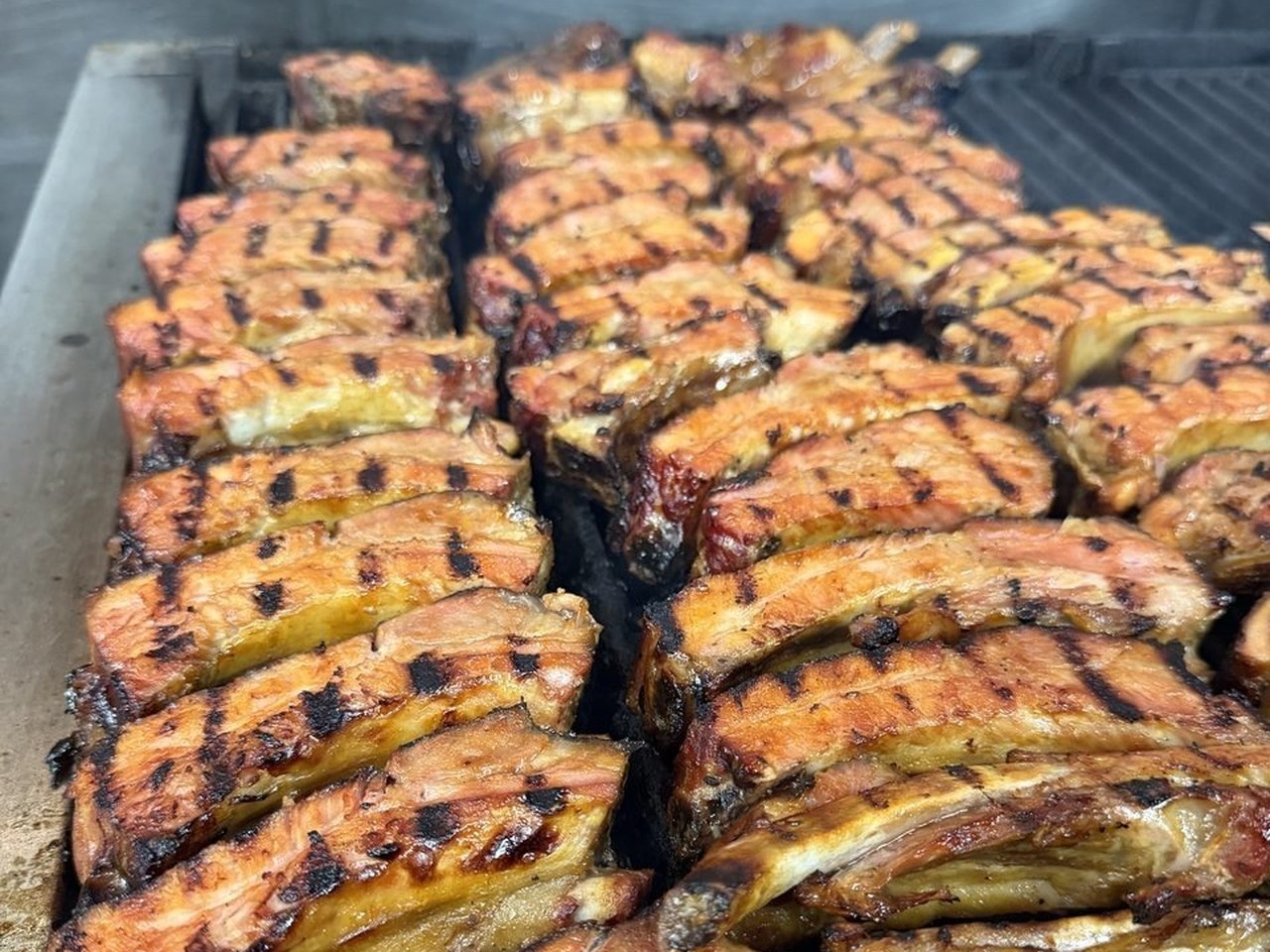 Ribs on the grill — fresh for catering trays